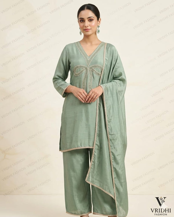 Full Stitched Designer suit on Simmer silk with cutdana hand work with pure bottom and 4 side lace work duppata